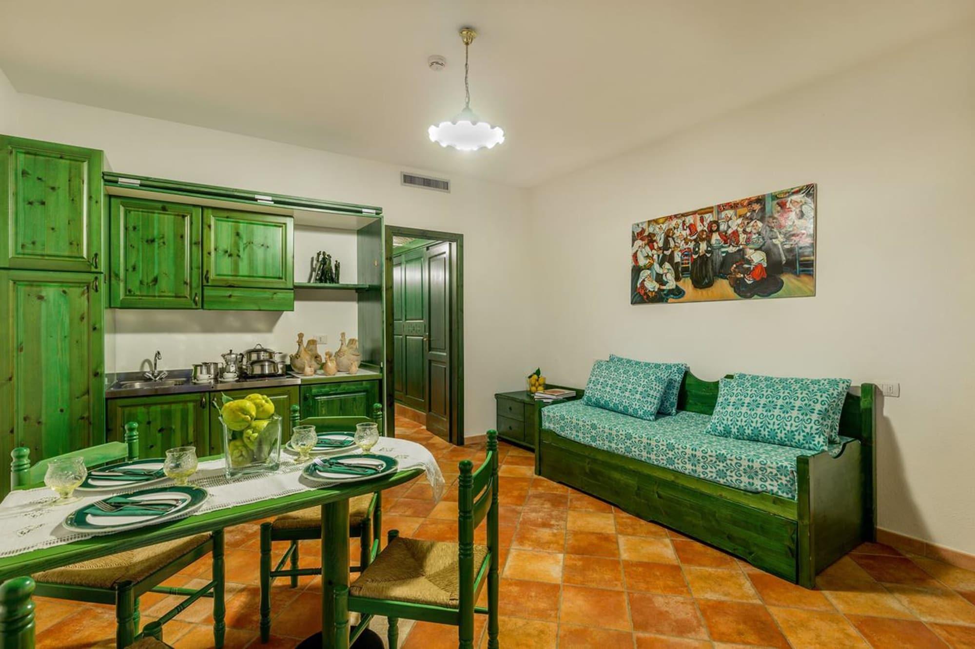 Residence Sos Alinos Cala Liberotto Bagian luar foto