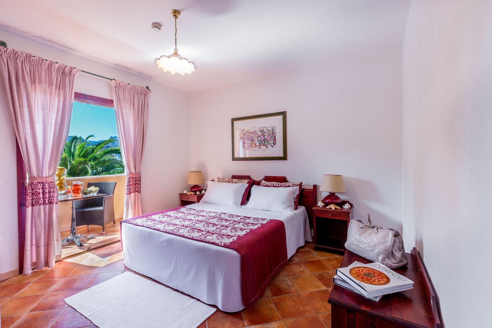 Residence Sos Alinos Cala Liberotto Bagian luar foto