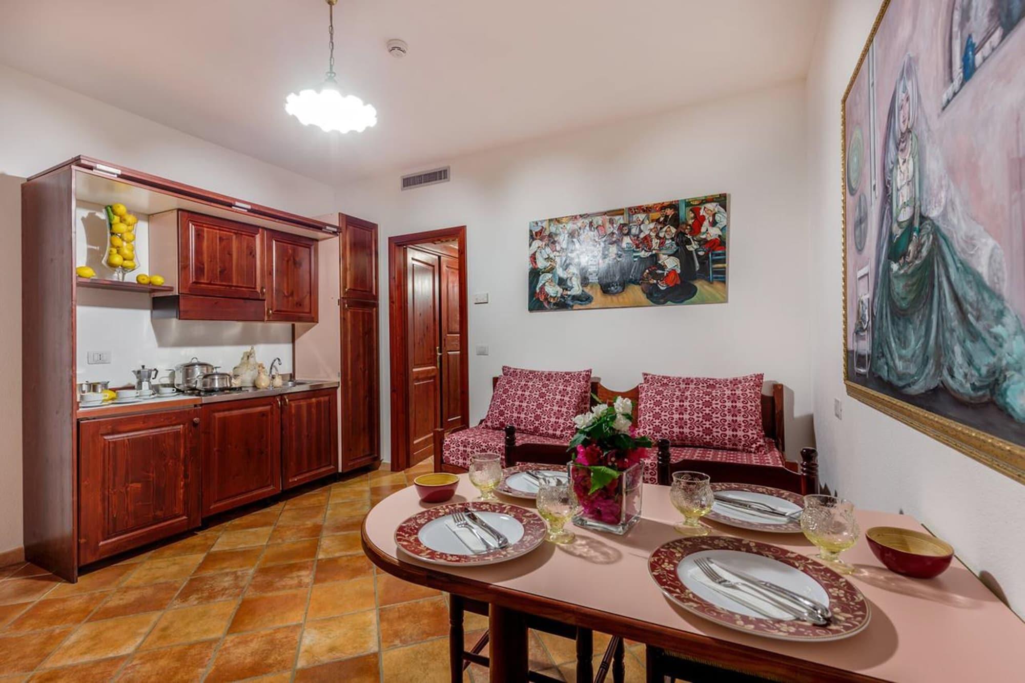 Residence Sos Alinos Cala Liberotto Bagian luar foto