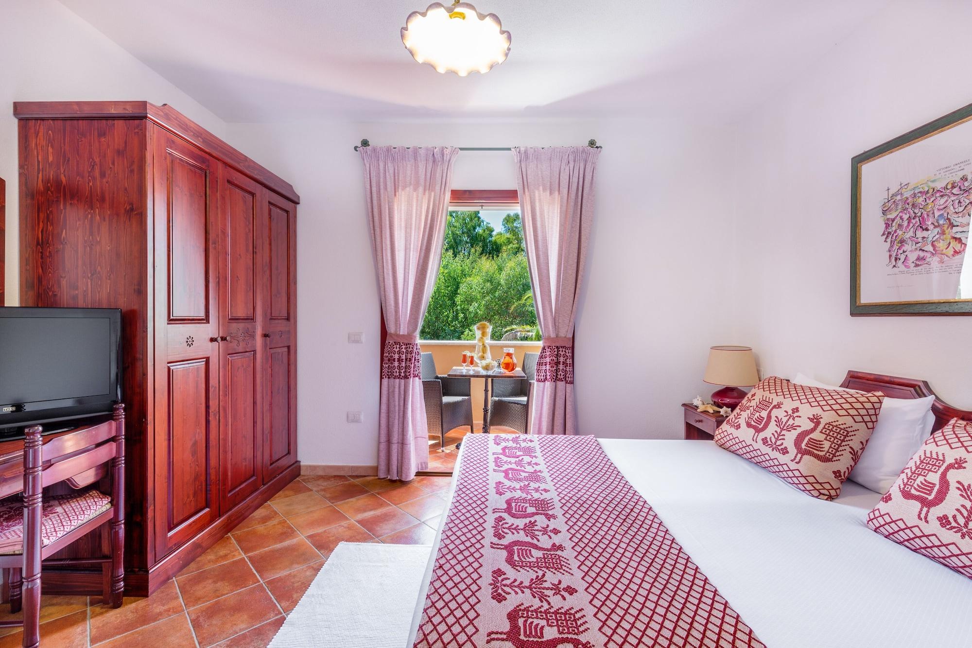 Residence Sos Alinos Cala Liberotto Bagian luar foto