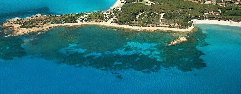 Residence Sos Alinos Cala Liberotto Bagian luar foto
